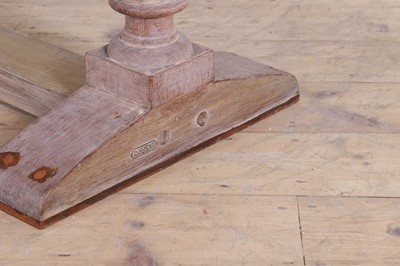 Lot 443 - A limed oak dining table