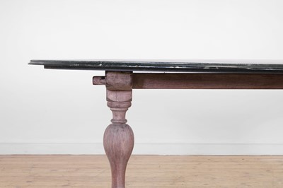 Lot 443 - A limed oak dining table