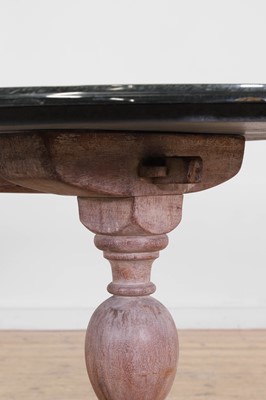 Lot 443 - A limed oak dining table