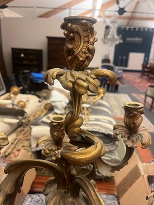 Lot 38 - A pair of Louis XV-style ormolu candelabra