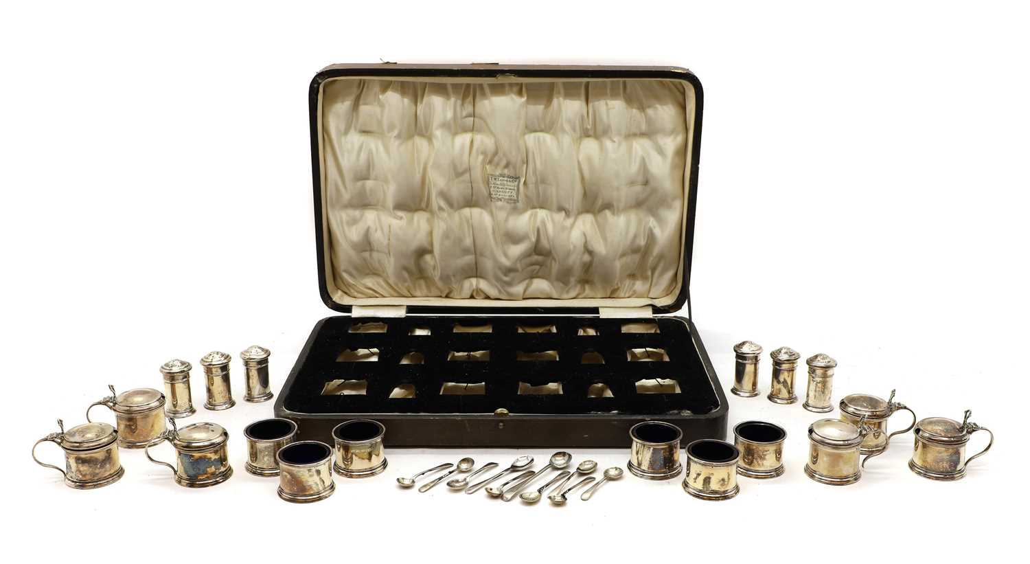 Lot 51 - A cased silver cruet set