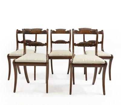 Lot 382 - A set of five Regency mahogany and brass inlaid dining chairs