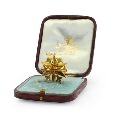 Lot 22 - An Edwardian gold split pearl starburst brooch