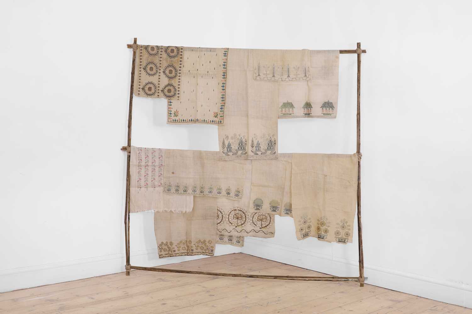 Lot 175 - A collection of embroidered linens,
