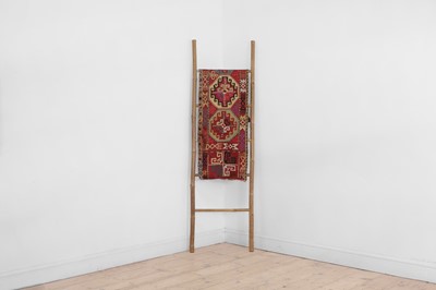Lot 177 - A silk embroidered Lakai suzani table runner or hanging