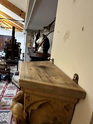 Lot 74 - A pair of Gothic Revival carved wooden corbels