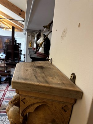 Lot 74 - A pair of Gothic Revival carved wooden corbels