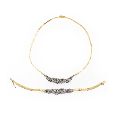 Lot 135 - An 18ct gold sapphire and diamond bracelet and necklace suite