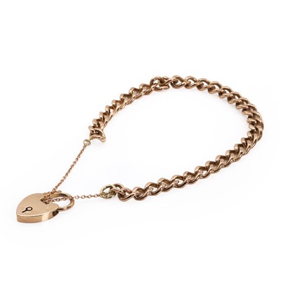 Lot 329 - A 9ct gold bracelet with heart padlock