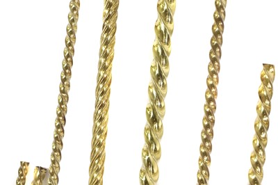 Lot 32 - Eleven various lengths of fairground barley-twist brass poles