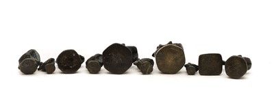 Lot 72 - A group of ten bronze opium weights