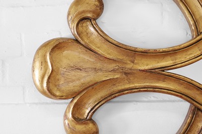 Lot 46 - A large Hollywood Regency giltwood mirror