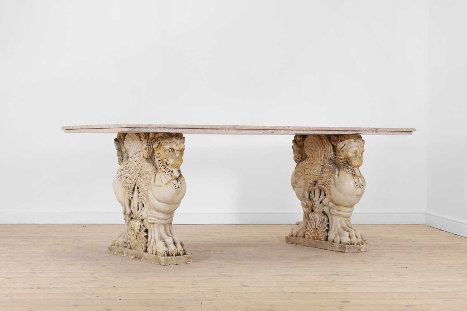 Lot A marble and travertine console table after the antique