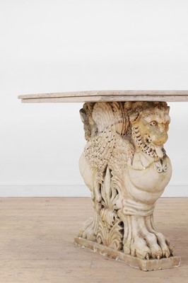 Lot 53 - A marble and travertine console table after the antique