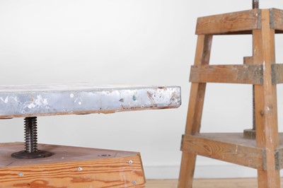 Lot 80 - A set of three pine and metal pottery stands