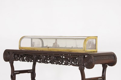 Lot 612 - A brass and glass medical display case