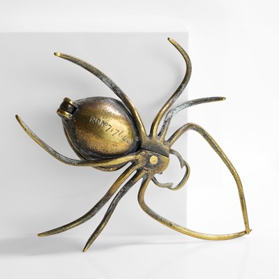Lot 23 - A brass spider desk stand or inkwell