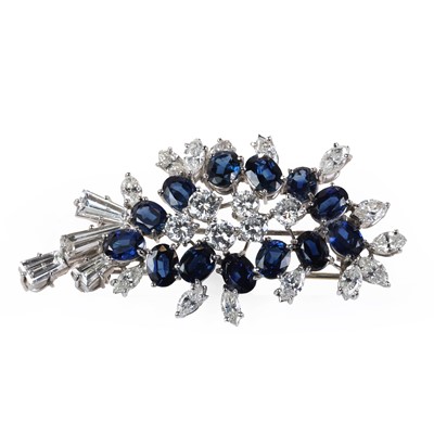 Lot 83 - A white gold sapphire and diamond clip brooch