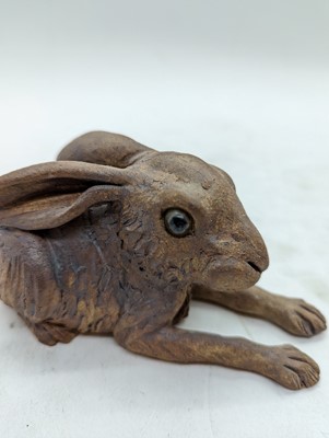 Lot 97 - A group of four pottery hares