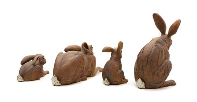 Lot 97 - A group of four pottery hares