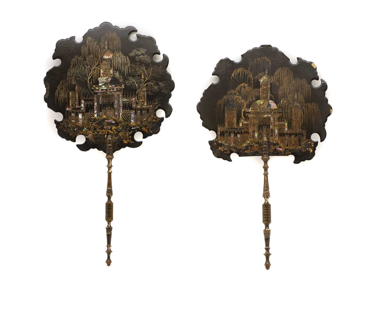 Lot 191 - A pair of Victorian papier mache face screens