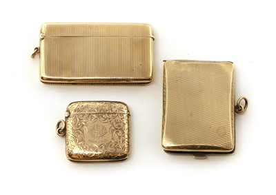 Lot 15 - A group of three 9ct gold vesta cases