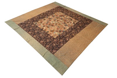 Lot 447 - A printed cotton quilted throw