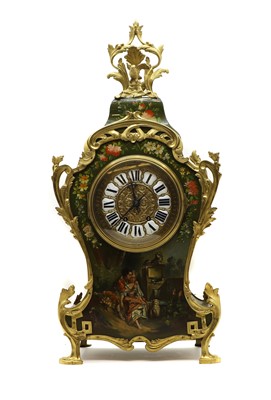 Lot 164 - A Louis XV style painted wood mantel clock
