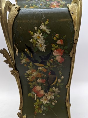 Lot 164 - A Louis XV style painted wood mantel clock