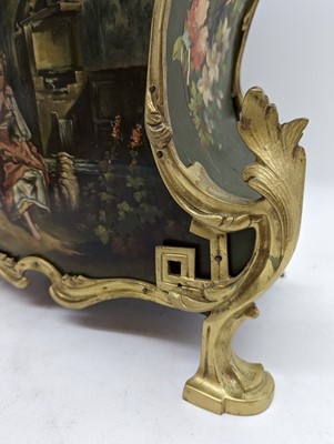 Lot 164 - A Louis XV style painted wood mantel clock