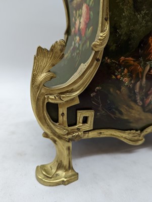 Lot 164 - A Louis XV style painted wood mantel clock