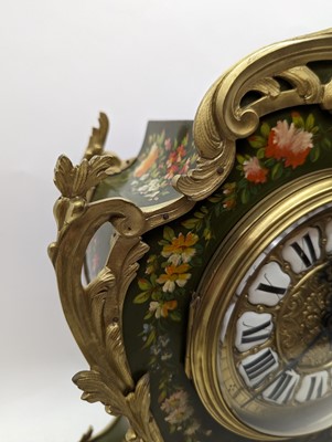 Lot 164 - A Louis XV style painted wood mantel clock