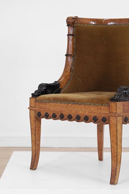 Lot 61 - A Charles X-style faux maple bergère