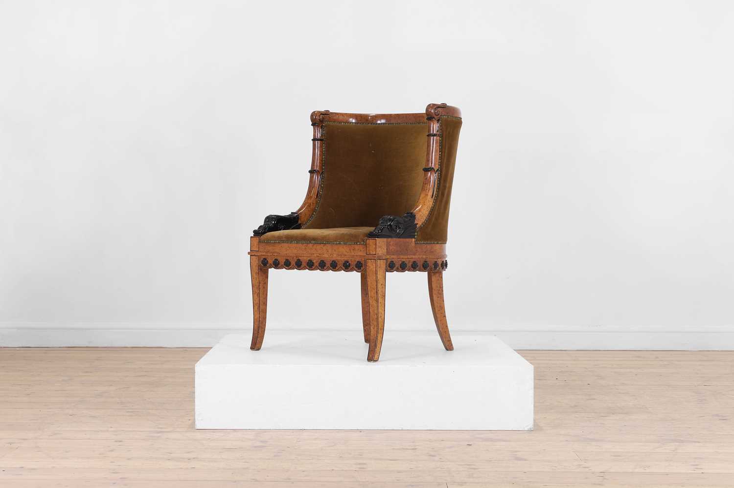 Lot 61 - A Charles X-style faux maple bergère