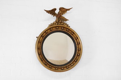 Lot 362 - A Regency-style giltwood convex mirror