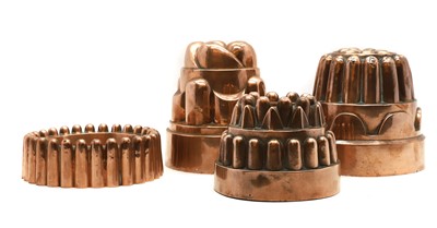 Lot 203 - A group of four Victorian copper jelly moulds
