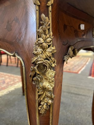 Lot 27 - A Louis XV-style kingwood and tulipwood marquetry bureau plat