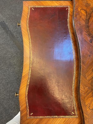 Lot 27 - A Louis XV-style kingwood and tulipwood marquetry bureau plat