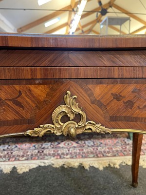 Lot 27 - A Louis XV-style kingwood and tulipwood marquetry bureau plat