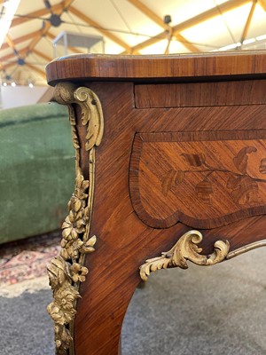 Lot 27 - A Louis XV-style kingwood and tulipwood marquetry bureau plat