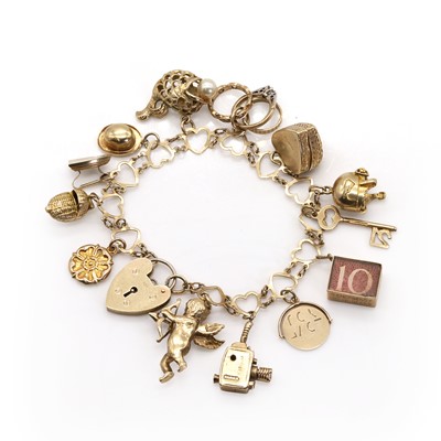 Lot 332 - A 9ct gold charm bracelet