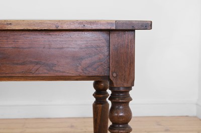 Lot 64 - A Victorian oak kitchen table