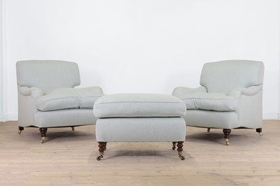 Lot A pair of upholstered armchairs by George Smith