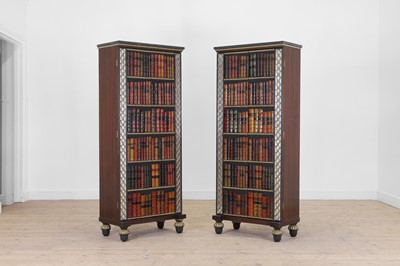 Lot 18 - A pair of painted and parcel-gilt wooden cupboards