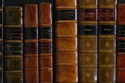 Lot 18 - A pair of painted and parcel-gilt wooden cupboards