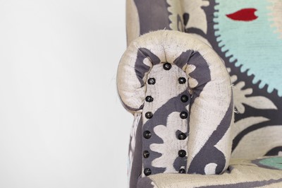 Lot 49 - A Victorian-style wingback armchair