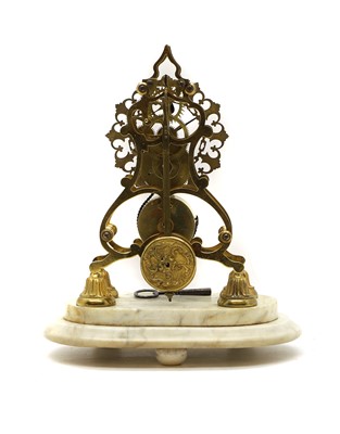 Lot 173 - A brass skeleton timepiece clock