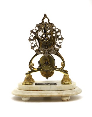 Lot 173 - A brass skeleton timepiece clock