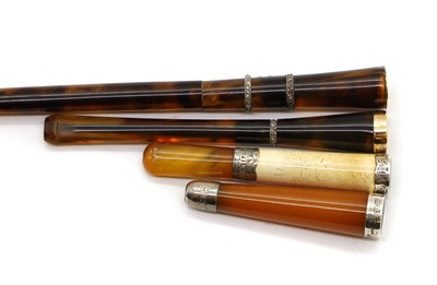 Lot 53 - Two tortoiseshell and diamond inlaid cigarette holders