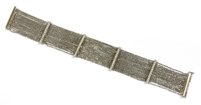 Lot 1120 - An 18ct white gold diamond set bracelet